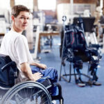 person in wheelchair from spinal cord injury